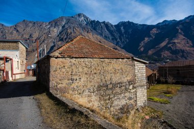 Kazbegi, Georgia : 10-11-2022 : Village Of Gergeti In Georgia, with the beautiful Caucasus mountain peaks and meadow surrounded .