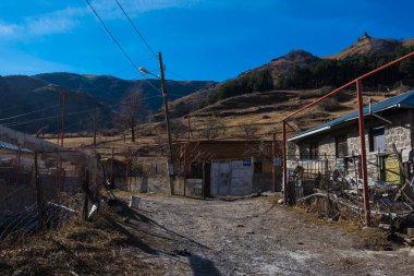 Kazbegi, Georgia : 10-11-2022 : Village Of Gergeti In Georgia, with the beautiful Caucasus mountain peaks and meadow surrounded .
