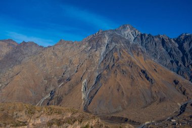 Georgia : 10-11-2022 : Country of Georgia, Kazbegi, Panoramic landscape of beautiful natural mountains, view of amazing Caucasus mountain peaks and meadows in Kazbegi national park.