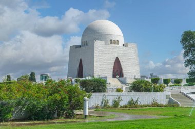 Picture of mausoleum of Quaid-e-Azam in bright sunny day, also known as mazar-e-quaid, famous landmark of Karachi Pakistan and tourist attraction of Pakistan. clipart
