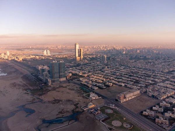 karachi pakistan, Aerial photograph of cityscape and landmarks of karachi city, aerial picture of bahria icon tower, dolmen mall clifton, harbor front. Sunrise at karachi, sea view, Business hub