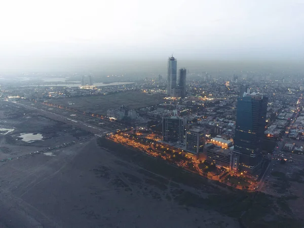 karachi pakistan, Aerial photograph of cityscape and landmarks of karachi city, aerial picture of bahria icon tower, dolmen mall clifton, harbor front. Sunrise at karachi, sea view, Business hub