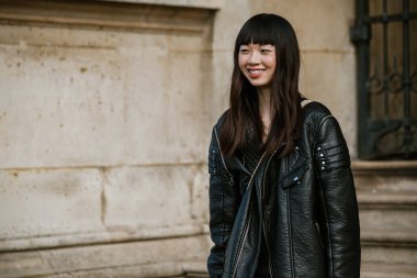 A model outside Each X Other show during Paris Fashion Week Womenswear Spring Summer 2019