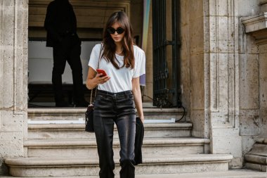 A model outside Each X Other show during Paris Fashion Week Womenswear Spring Summer 2019