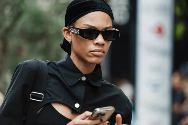 stock image A model outside ANNAKIKI show during Milan Fashion Week Womenswear Spring/Summer 2024.