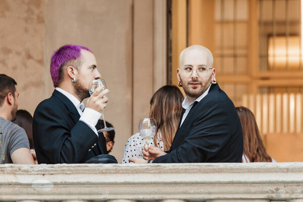 Guests outside BUDAPEST SELECT show during Milan Fashion Week Womenswear Spring/Summer 2024.