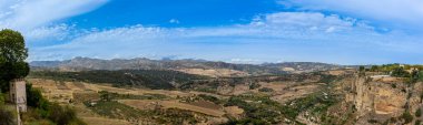 RONDA, SPAIN - OCTOBER 23, 2022: Panoramic view on surrounding mountains in Ronda, Spain on October 23, 2022