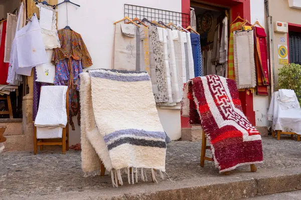 RONDA, SPAIN - OCTOBER 23, 2022: Walking on white cozy streets in Ronda, Spain on October 23, 2022