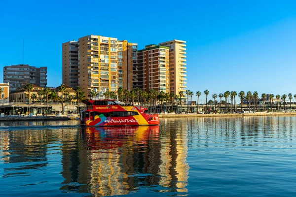 stock image MALAGA, SPAIN - JANUARY 14, 2023: Catamaran cruise on sunset in port in Malaga, Spain on January 14, 2023