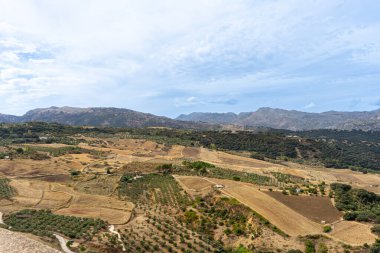 RONDA, SPAIN - OCTOBER 23, 2022: Panoramic view on surrounding mountains from Gate of Carlos V (Puerta de Carlos V) in Ronda, Spain on October 23, 2022