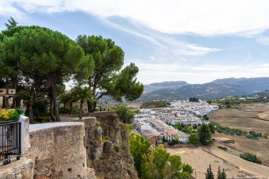 RONDA, SPAIN - OCTOBER 23, 2022: Panoramic view on surrounding mountains from Gate of Carlos V (Puerta de Carlos V) in Ronda, Spain on October 23, 2022