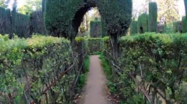 SEVILLA, SPAIN - DECEMBER 31, 2022: The gardens of the Royal Alczars of Seville historically known as al-Qasr al-Muriq in Sevilla, Spain on December 31, 2022