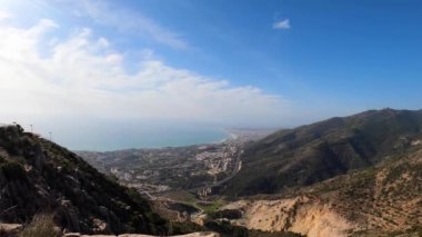 Landscape of Mediterranean sea and surrounding towns from the top of mount Calamorro, near Malaga in the Costa del Sol in Spain