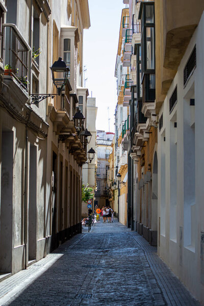 CADIZ, SPAIN - APRIL 30, 2023: Walking in city center in Cadiz, Spain on April 30, 2023