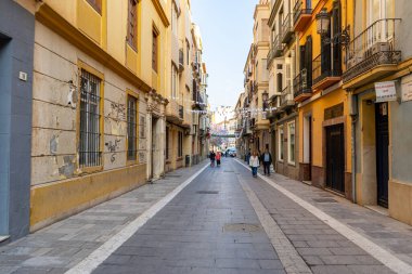 MALAGA, İspanya - 20 Mayıs 2023: Malaga, İspanya 'da Madre de Dios caddesinde yürüyüş (Madre de Dios)