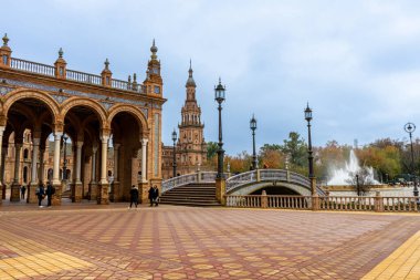 SEVILLA, SPAIN - JANUARY 1, 2023: Spain Square (Plaza de Espana), built on 1928 the Regionalism Architecture mixing Renaissance and Moorish styles in Sevilla, Spain on January 1, 2023