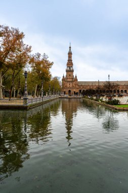 SEVILLA, SPAIN - JANUARY 1, 2023: Spain Square (Plaza de Espana), built on 1928 the Regionalism Architecture mixing Renaissance and Moorish styles in Sevilla, Spain on January 1, 2023
