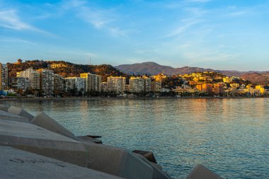 MALAGA, SPAIN - JANUARY 14, 2023: Panoramic view of night Malaga coastline, beach Malageta in Malaga, Spain on January 14, 2023