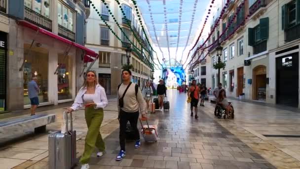 2023年8月13日 スペインのマラガにあるラリオ通りの始まりのフェリアの門 — ストック動画