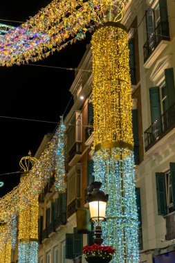 MALAGA, İspanya - 3 Aralık 2022: Malaga, İspanya 'da Marqus de Larios caddesinde Noel süslemeleri