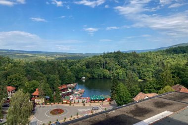 SOVATA, ROMANIA - AUGUST 24, 2022: Sovata city and Ursul lake resort. It is known for balneoclimateric and mud treatments. Sovata, Romania on August 24, 2022 clipart