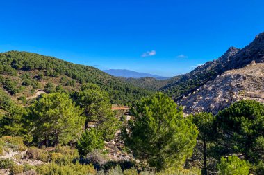 Hiking to Lucero peak of the Natural Park of Tejeda, Almijara and Alhama in Malaga, Andalusia, Spain clipart