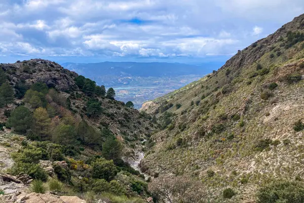 stock image Panoramic view from hiking trail to Maroma peak in thunderstorm day, Sierra Tejeda, Spain 