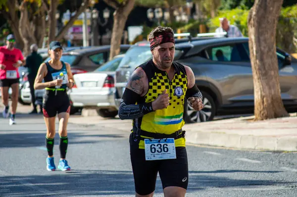 stock image TORREMOLINOS, SPAIN - FEBRUARY 4, 2024: Runners on half Marathon de Torremolinos in Torremolinos, Spain on February 4, 2024