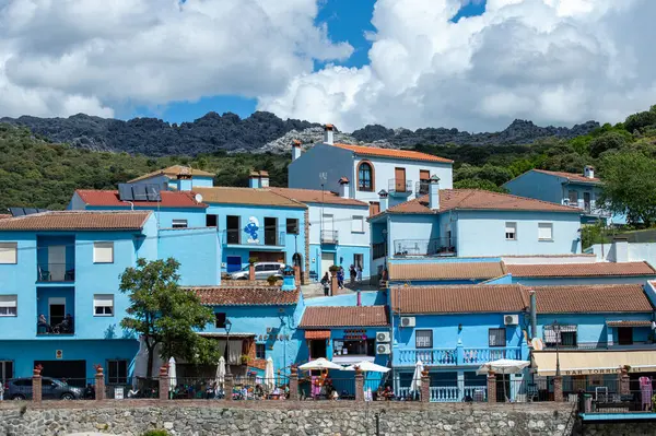 stock image JUZCAR, SPAIN - APRIL 28 2024: Visiting of blue Smurfs Village in Juzcar, Spain on April 28, 2024