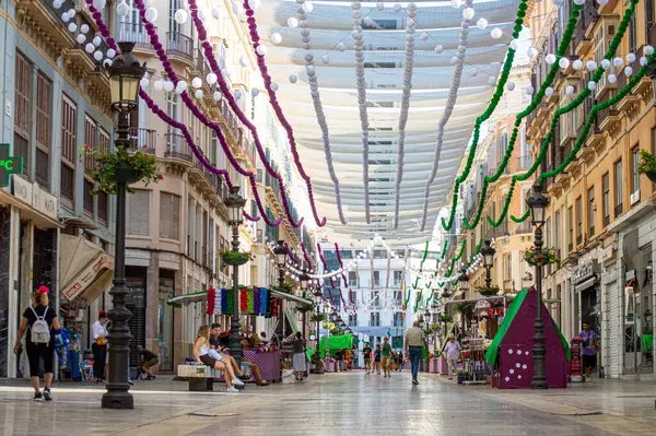 stock image MALAGA, SPAIN - AUGUST 13, 2023: Morning walk on Larios street in Malaga, Spain on August 13, 2023