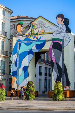 MALAGA, İspanya - 13 Ağustos 2023: 13 Ağustos 2023 'te İspanya' nın Malaga kentindeki Larios Caddesi 'nin başındaki Feria Kapısı