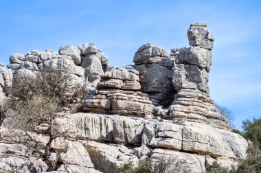 Torcal de Antequerra Ulusal Parkı 'nda yürüyüş, kireçtaşı kaya oluşumları ve Endülüs, Malaga, İspanya' da alışılmadık karst şekilleriyle tanınan.