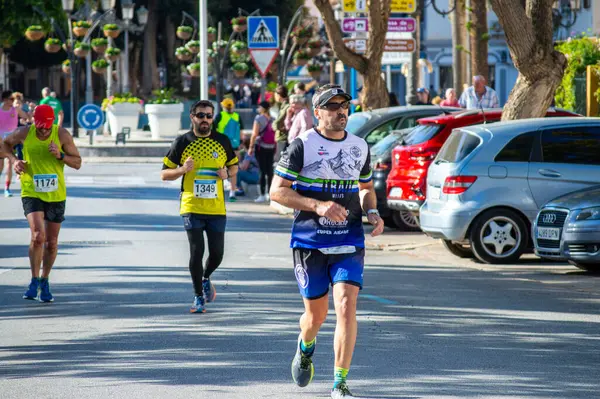 stock image TORREMOLINOS, SPAIN - FEBRUARY 4, 2024: Runners on half Marathon de Torremolinos in Torremolinos, Spain on February 4, 2024