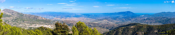 Panoramic view on pine forest on hiking trail to peak Torrecilla, Sierra de las Nieves national park, Andalusia, Spain