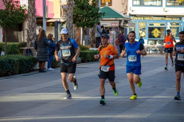 TORREMOLINOS, SPAIN - FEBRUARY 4, 2024: Runners on half Marathon de Torremolinos in Torremolinos, Spain on February 4, 2024 clipart