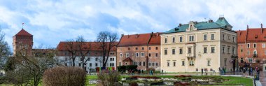 KRAKOW, POLAND - DECEMBER 21, 2023: Wawel Royal castle on Wawel Hill, a fortified residency, established on the orders of King Casimir III the Great in Krakow, Poland on December 21, 2023 clipart