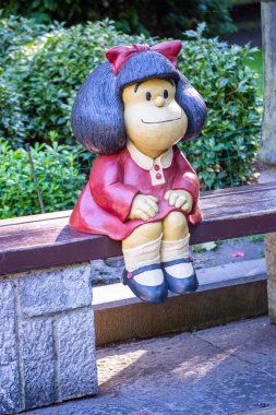 OVIEDO, SPAIN - SEPTEMBER 16, 2024: Mafalda statue in San Francisco park in Oviedo, Spain on September 16, 2024 clipart