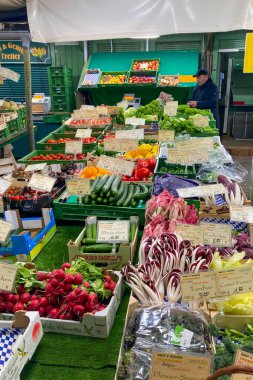 MUNICH, GERMANY - DECEMBER 2, 2024: Viktualienmarkt is a vibrant Munich market offering fresh produce, herbs, local specialties, and cultural charm in the city center especially in Christmas clipart