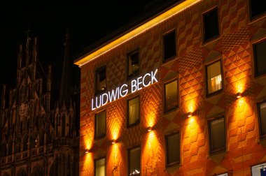 MUNICH, GERMANY - DECEMBER 1, 2024: Wonderful Christmas lights of LUDWIG BECK shopping center on Marienplatz square in Munich, Germany on December 1, 2024 clipart