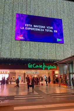 MALAGA, SPAIN - DECEMBER 21, 2024: The city center glows with enchanting Christmas decorations, creating a festive wonderland in Malaga, Spain clipart