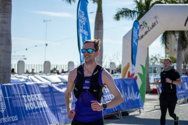 TORREMOLINOS, SPAIN - FEBRUARY 2, 2025: Runners on half Marathon de Torremolinos in Torremolinos, Spain on February 2, 2025 clipart