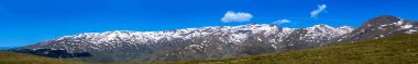 Panoramic view on snowy mountains on hiking trail to Mulhacen peak in the spring, Sierra Nevada range, Andalusia, Spain clipart