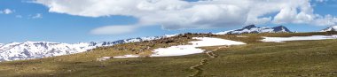 Panoramic view on snowy mountains on hiking trail to Mulhacen peak in the spring, Sierra Nevada range, Andalusia, Spain clipart