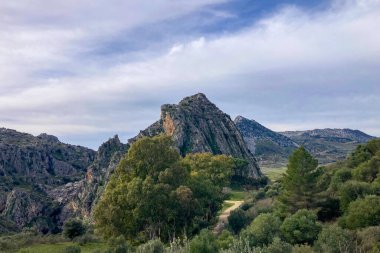 Hiking to Montejaque dam (Presa de Montejaque) and Hundidero cave (Cueva del Hundidero) in the province of Malaga, Andalusia, Spain clipart