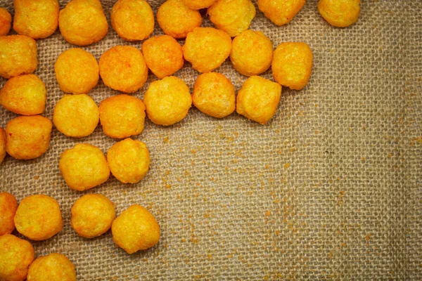 Cheese Flavoured Puffs Balls Closeup Served Wooden Bowl Gunny Sack — Stock Photo, Image