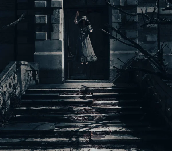Ghost women floating in the air on abandoned house stairs. Spooky mystery halloween scene idea.