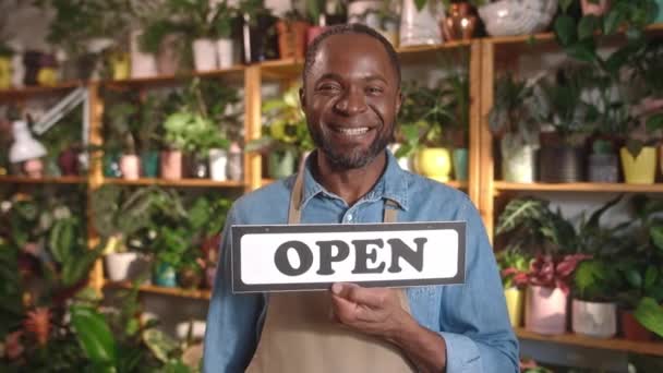 Happy Successful African American Young Man Holding Open Sign Looking — Video