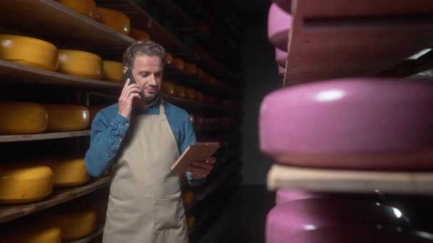 Handsome Caucasian Man Walking Dark Cheese Storage Work Carefully Looking — Stock Video