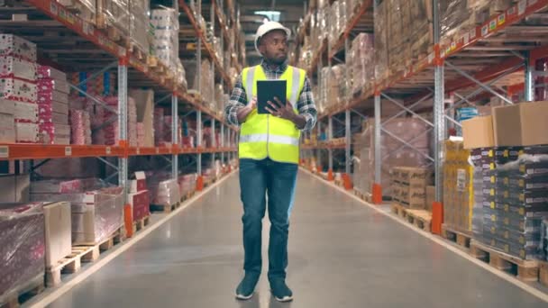 African American Male Walking Storage Boxes Goods Man Helmet Reflective — Stock Video