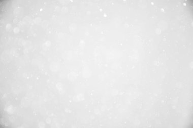 Beyaz kar arka planı. Noel Bokeh 'i bulanıklaştırdı